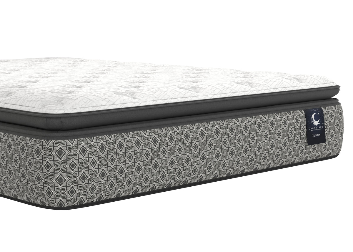 Close-up of the Hypnos mattress’s soft, breathable white quilted sleeping surface.