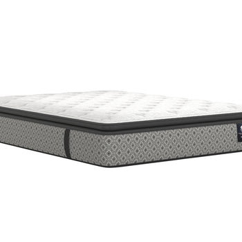 Angled view of the Hypnos plush Euro top mattress with a white quilted sleeping surface.