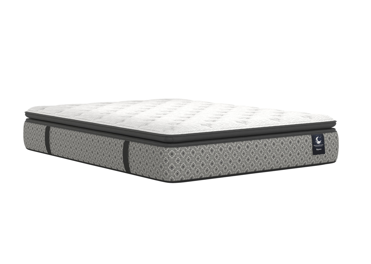 Angled view of the Hypnos plush Euro top mattress with a white quilted sleeping surface.
